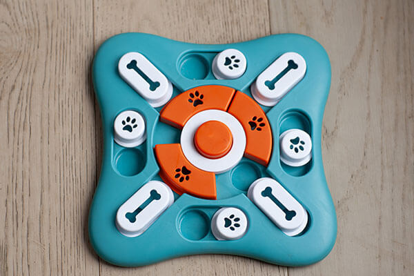 Perplexing Puzzle enrichment - treat puzzle game for dogs using moving pieces